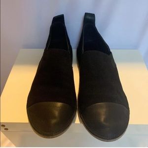 Black slip-on flats